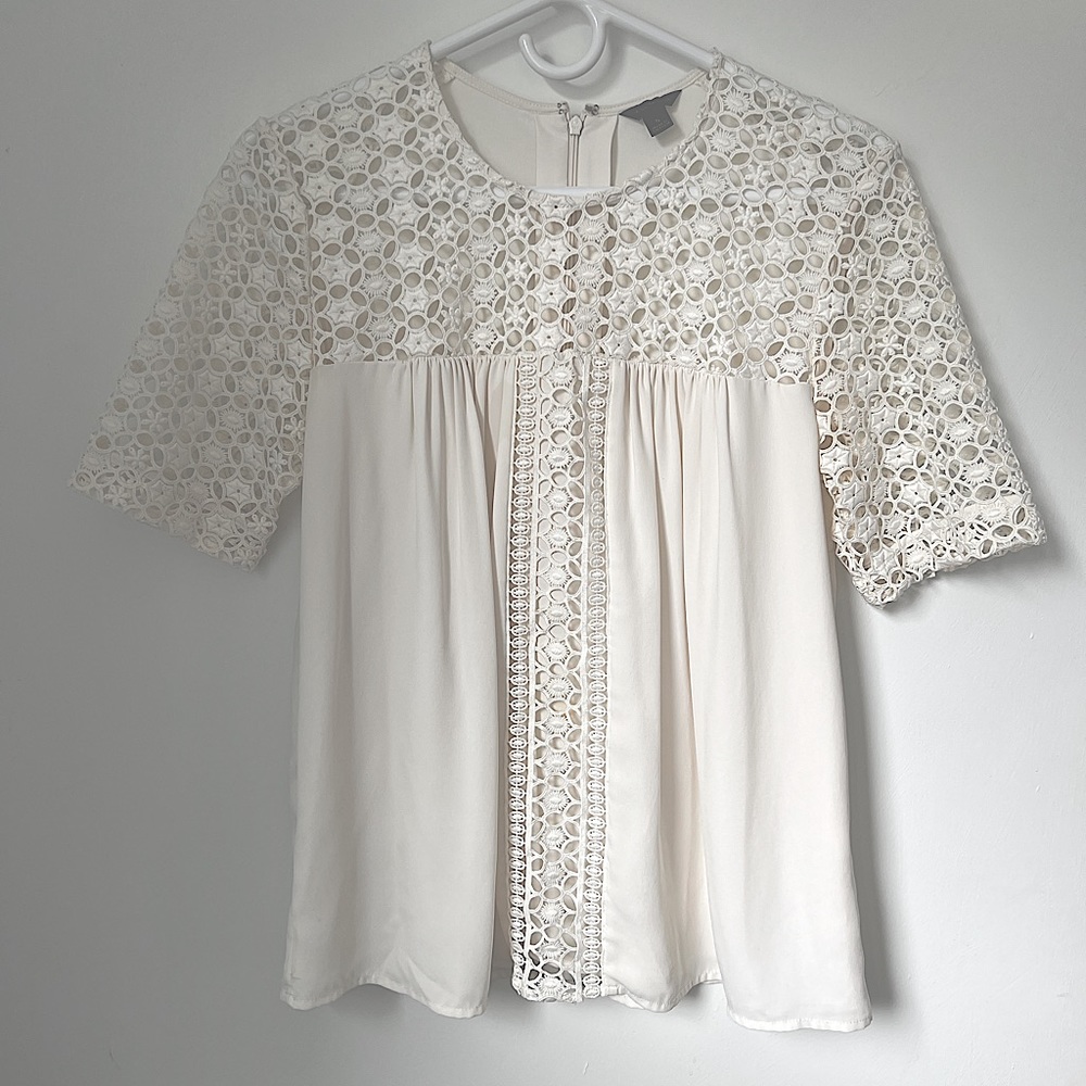 Embroidered white blouse by Ann Taylor. Size Small
